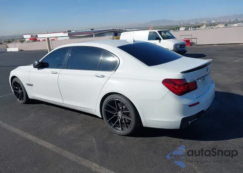 2014 BMW 740 Li из США, поврежденный, VIN WBAYE4C53ED138311